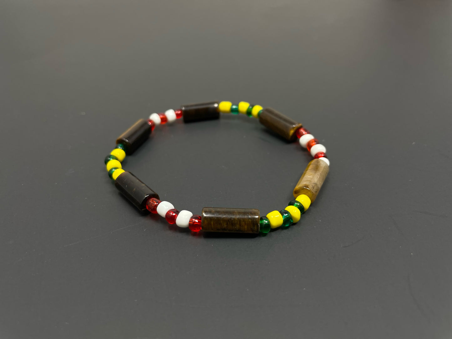 Hand Of Orunla W. Tube Tigers Eye